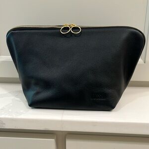 KUSSHI black leather Vacationer Makeup Bag with organizers
